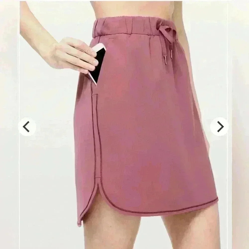 Lululemon On The Fly Skirt
Woven Misty Merlot  Rose Pink Size 4 - Picture 2 of 9
